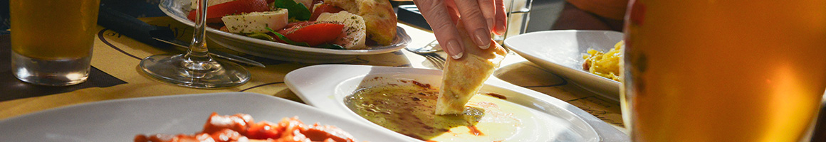 Eating Greek Mediterranean at Demos Watertown restaurant in Watertown, MA.